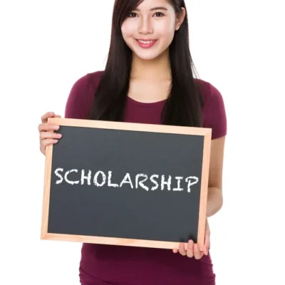 asian-woman-with-chalkboard-showing-a-word-scholar-2023-11-27-05-11-22-utc_resize
